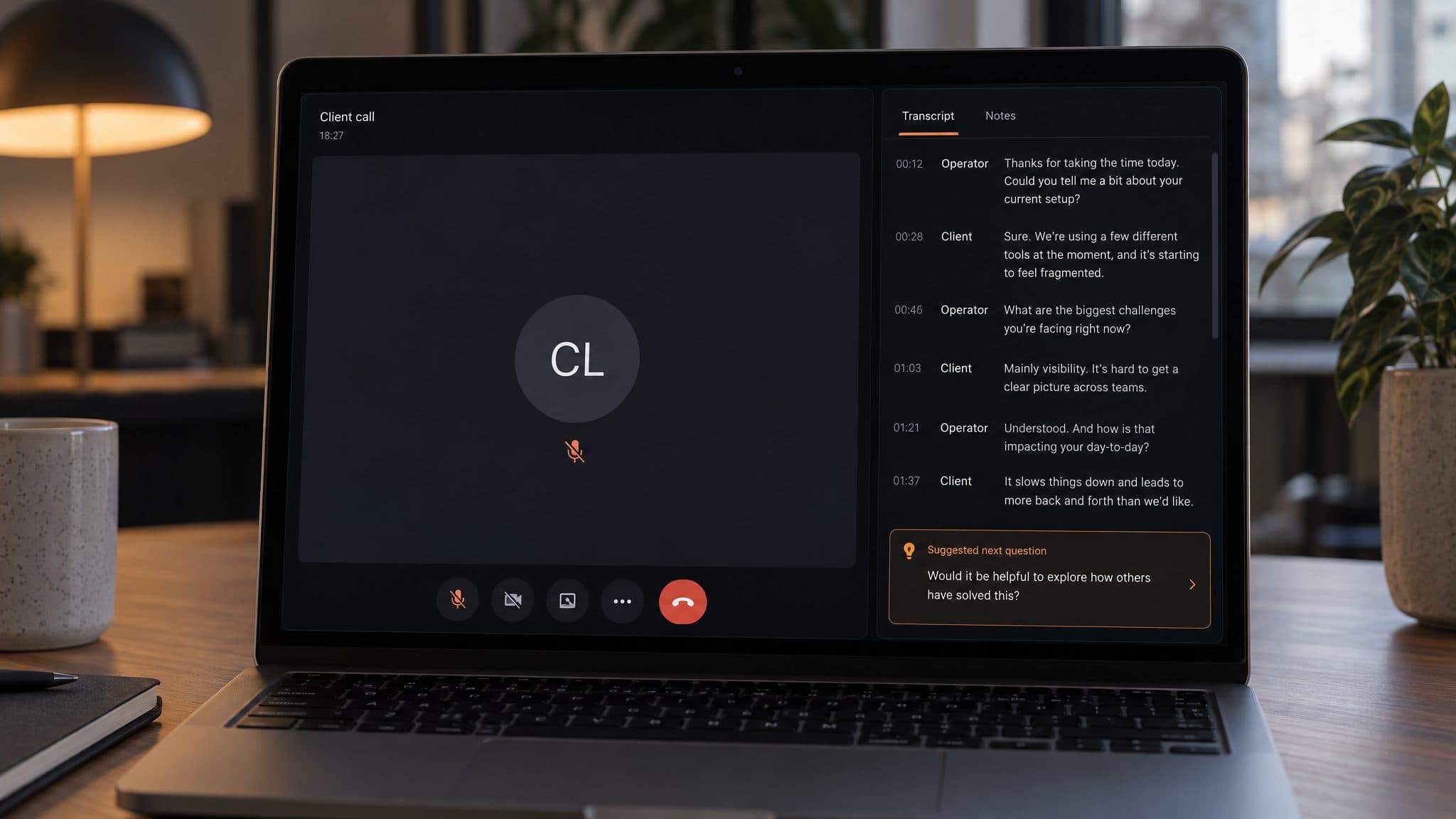 Laptop with a video call on the left and a narrow co-pilot window with a live transcript on the right